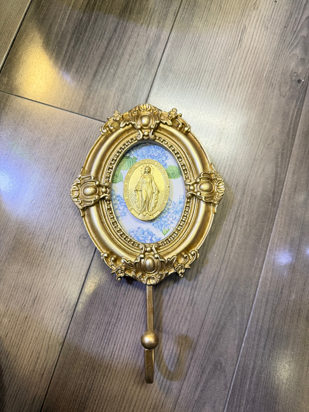 Our Lady of the Miraculous Medal Intaglio on blue hydrangea background set on vintage wall hook