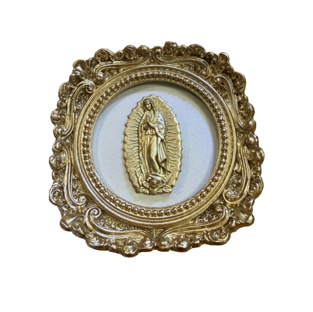 Our Lady of Guadalupe intaglio on champagne pearl backed on round vintage frame