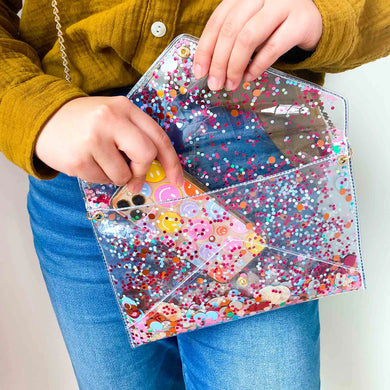 THE ESSENTIALS CONVERTIBLE CONFETTI CLUTCH