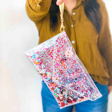 THE ESSENTIALS CONVERTIBLE CONFETTI CLUTCH